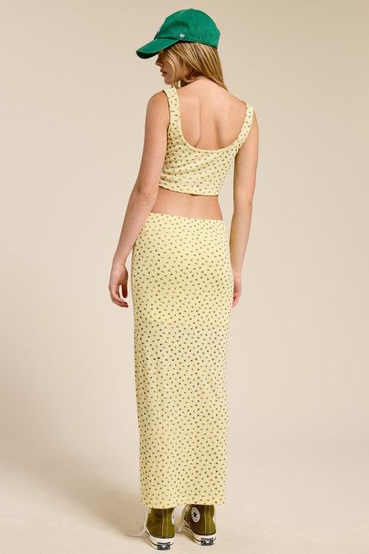 Mimosa floral print corset-fitted tank top and matching skirt set with vibrant flower patterns and fitted design.