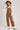 Women’s brown barrel leg overalls by blueivy, stylish western jumpsuit with cowgirl charm, shown on a model.