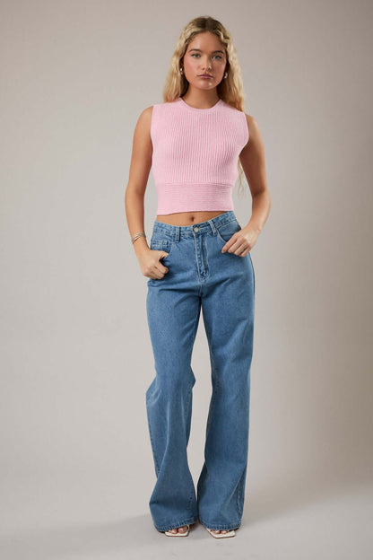 LE LIS sleeveless sweater top with back bow detail, stylish knit sweater for a chic layered look.