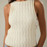 LE LIS boat neck sleeveless structured sweater top shown on a mannequin, featuring a fitted design and clean lines.