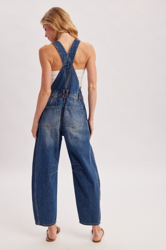 Women’s blue denim barrel overalls with relaxed wide-leg fit, bib front, and adjustable straps, by blueivy.