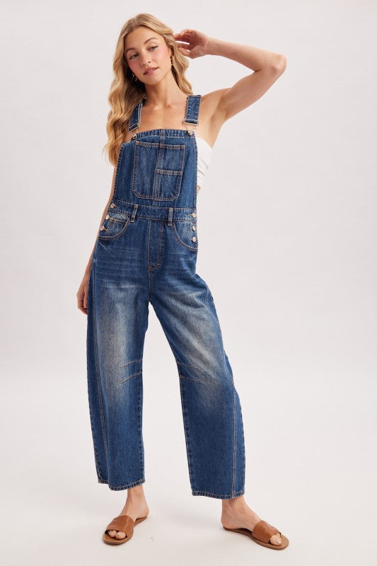 Women’s blue denim barrel overalls with relaxed wide-leg fit, bib front, and adjustable shoulder straps, by blueivy.