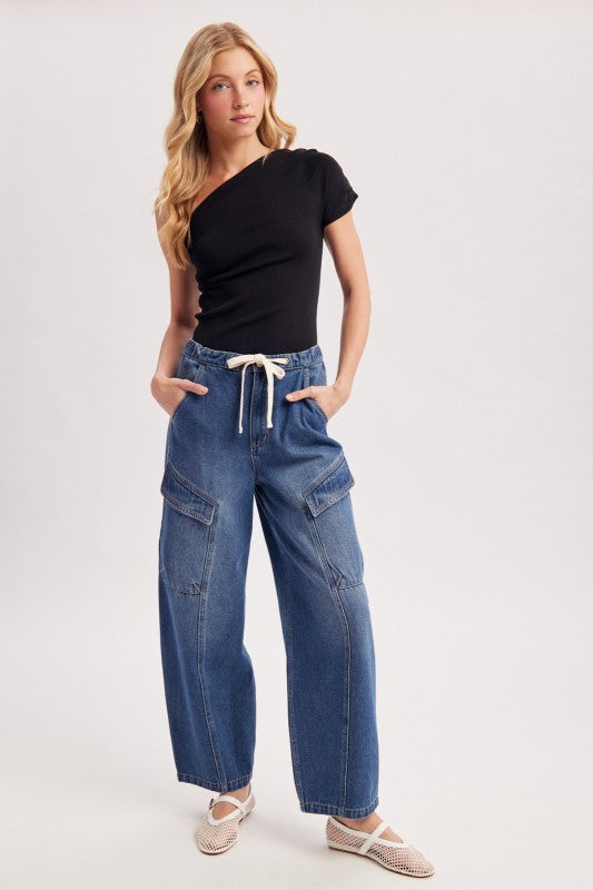 Cowgirl Charm draped knit asymmetric one-shoulder top, showing its stylish design and soft fabric on a neutral background.