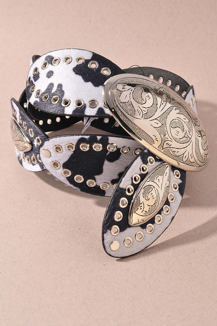 Western Leopard Concho Statement Belt by Merveille featuring leather strap with bold leopard and concho embellishments.
