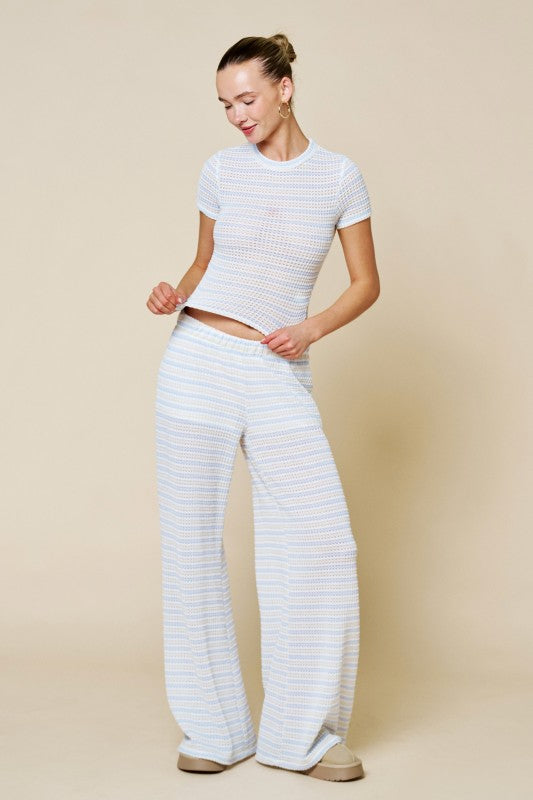 Blue Blush crochet knit lounge set with blue and white stripes, featuring a matching crop top and pants for comfortable casual wear.