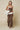 Blue Blush Mocha Stripe Lounge Set with contrast trim tank top and wide-leg pants, shown on a model.