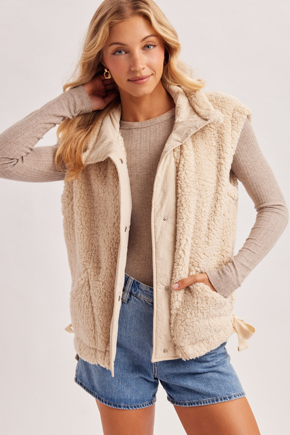 Blueivy women’s Sherpa button-down vest from Cowgirl Charm, short sleeve sweater with cozy fleece lining and stylish design.
