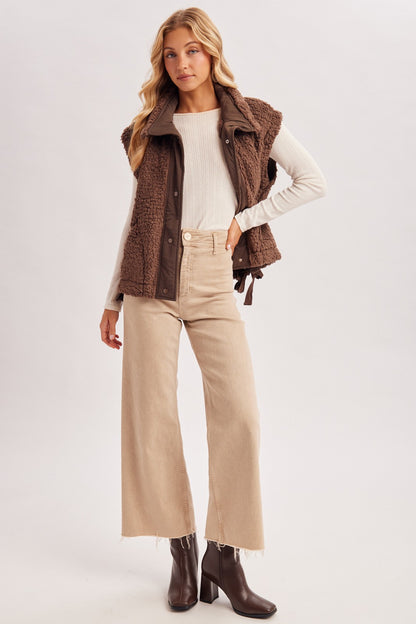 Blueivy women’s Sherpa button-down vest from Cowgirl Charm, a cozy short sleeve sweater with plush sherpa material.