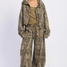 Emory Park high neck zip-up camo jacket with front zipper and fitted design, shown in a close-up view.