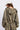 Emory Park high neck camo zip-up jacket with front zipper and fitted style, shown in a close-up view.