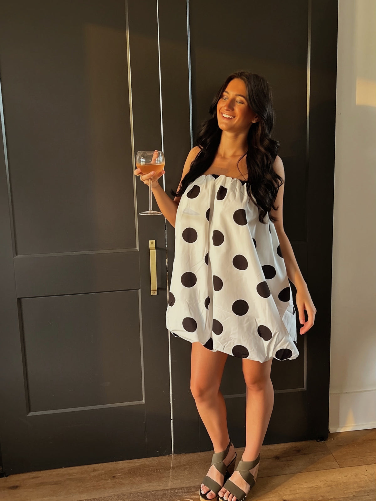 Day + Moon polka dot off-shoulder strapless mini balloon dress, featuring a playful off-strap design and vibrant polka dot pattern.