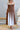 Chocolate brown and ivory contrast tie-shoulder midi dress by Sunday Up, featuring a stylish and elegant design.