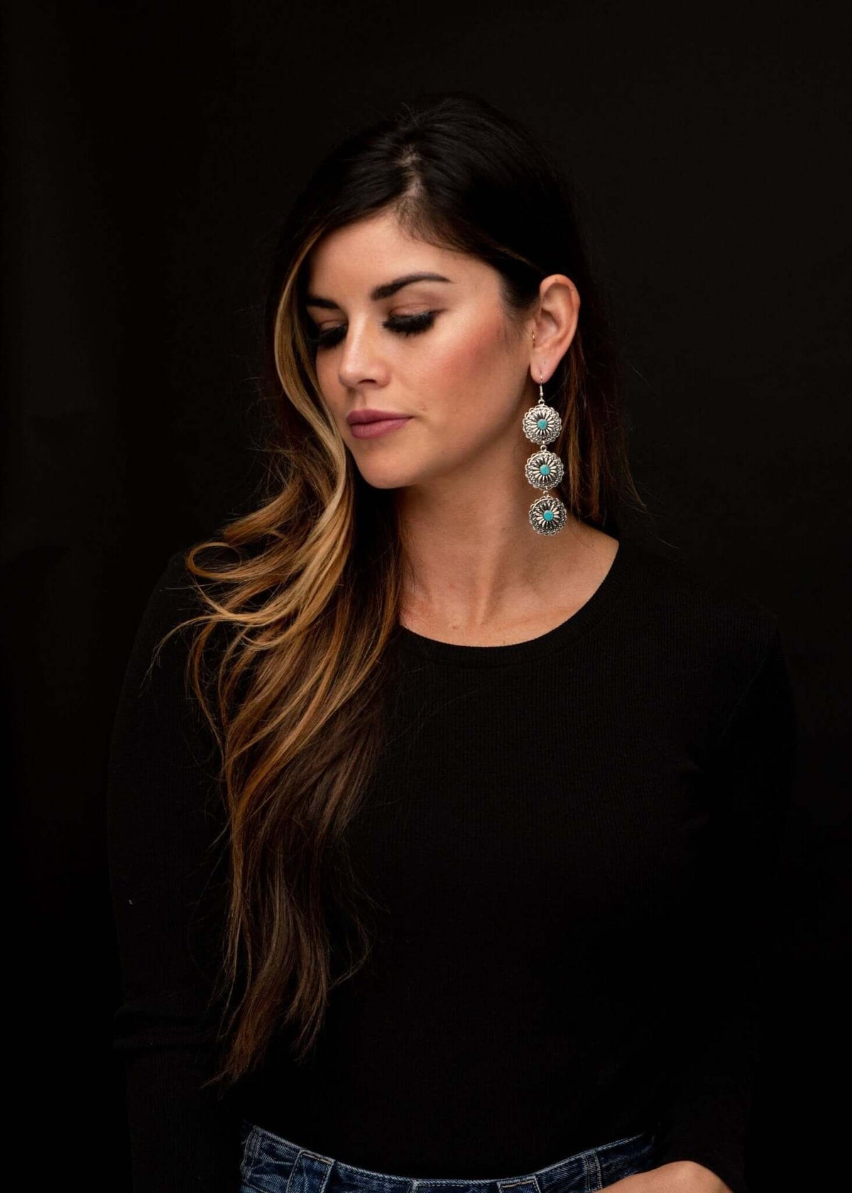 West & Co. 3-tier burnished silver and turquoise floral concho ear jewelry with layered design and detailed craftsmanship.