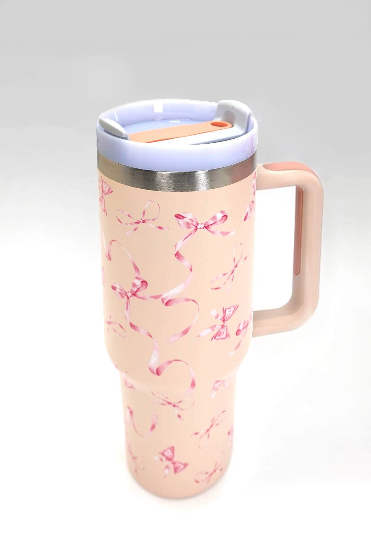 40oz stainless steel tumbler by JOSSLYN, all styles, with double-wall insulation, perfect for hot or cold drinks.