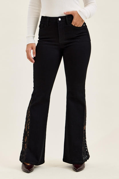 Black Judy Blue Jaqueline ultra flare jeans with lace hem, classic denim style, shown hanging on a white background.