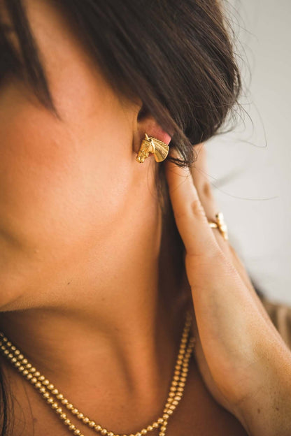 18K gold-plated burnished horse head stud earring from West & Co., featuring detailed equine design in jewelry accessories.