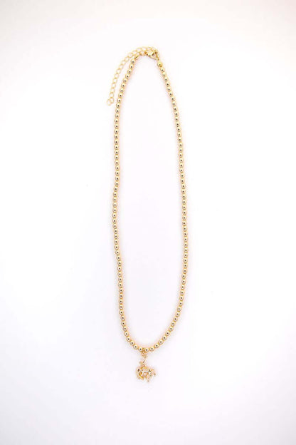 18-inch gold-plated beaded Y necklace with a 5-inch tail, available in white and yellow gold, from West & Co. jewelry.