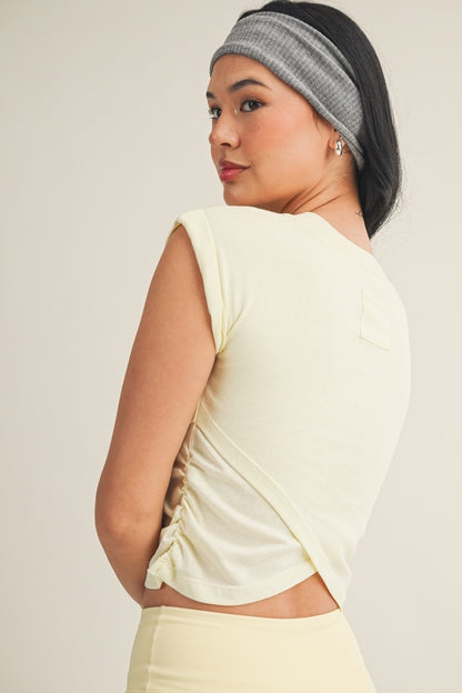 Kimberly C crossover top featuring a stylish blouse with a V-neck and long sleeves, in a lightweight fabric.