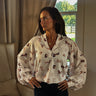 Cream Western Toile print balloon sleeve blouse by Vine and Love with cowgirl chic design and stylish puffed sleeves.