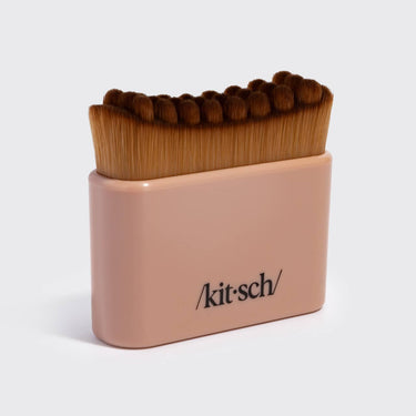 KITSCH Lymphatic Contour Face Brush in terracotta color, showing the soft bristles and ergonomic handle for facial lymphatic drainage.