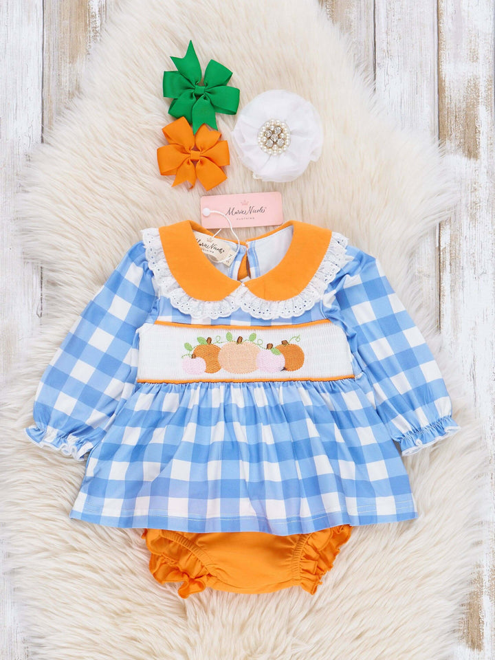 Kids' blue plaid smocked bloomers outfit with pumpkin embroidery from Marie Nicole Clothing, featuring a cute autumn-themed design.