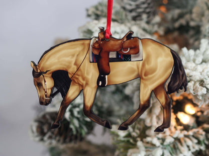 Buckskin Western riding quarter horse Christmas ornament by Classy Equine, detailed horse figurine with festive holiday accents.