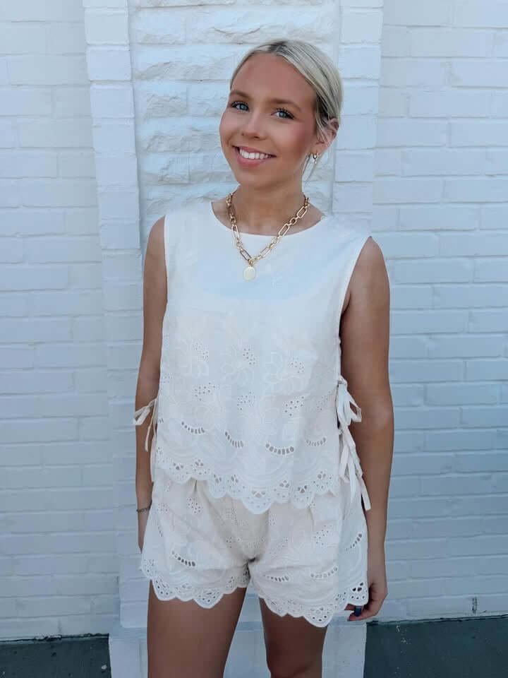 Linen embroidered two-piece set by Day + Moon with intricate floral embroidery on lightweight fabric, perfect for casual wear.