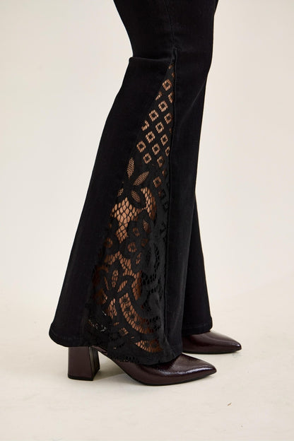 Judy Blue Jaqueline black denim jeans with lace hem and ultra flare design, showcasing stylish, fitted silhouette and detailed hem.