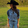 Women's chambray puff sleeve button-up blouse from Vine and Love, featuring a Western denim top with a relaxed fit and stylish details.