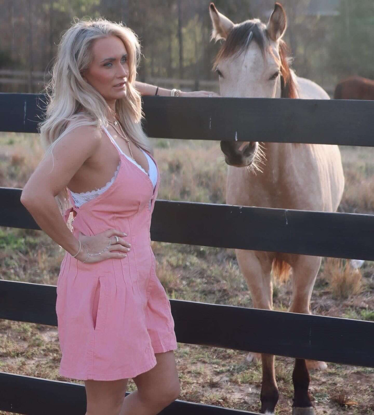 Wisteria Lane lightweight denim romper with adjustable straps, featuring a casual fit and classic denim wash.