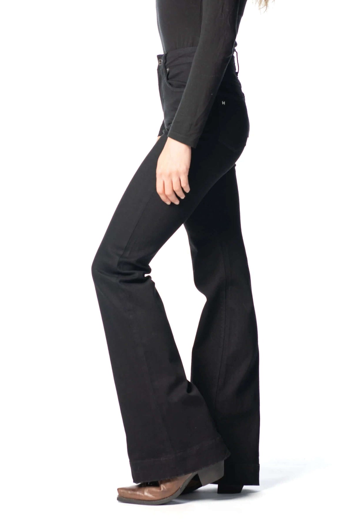 Black Haala Denim Bella flare trousers with black stitching, showcasing the stylish and comfortable denim design.