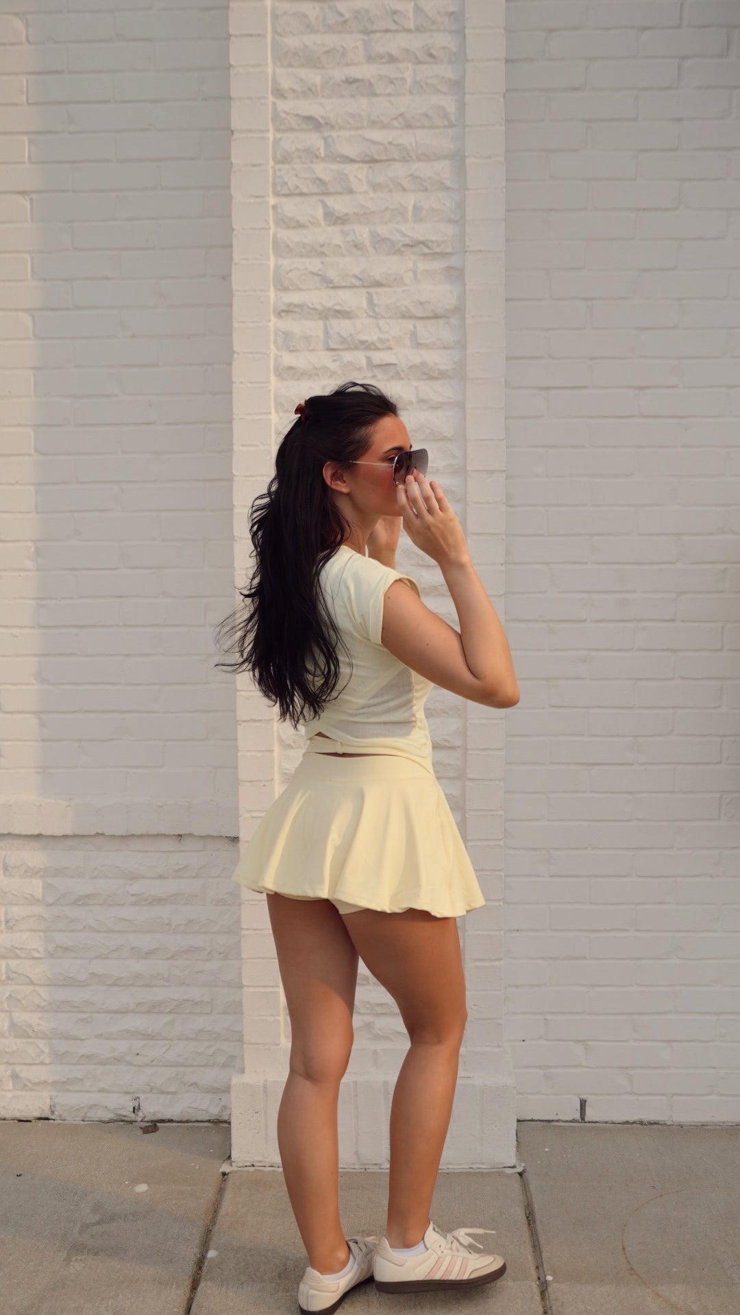 Kimberly C mini circle skort with bow back detail, lightweight bottoms with a flared, circular design and stylish back bow accent.