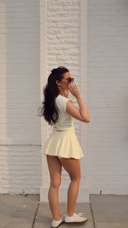 Kimberly C mini circle skort with bow back detail, lightweight bottoms with a flared, circular design and stylish back bow accent.