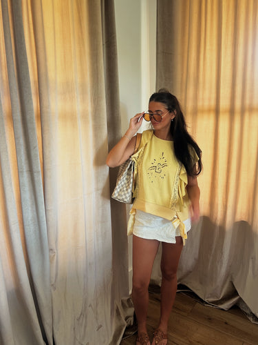 Bibi solid French Terry top with ruffle sleeve trim, casual long-sleeve shirt in soft fabric, close-up of sleeve detail.