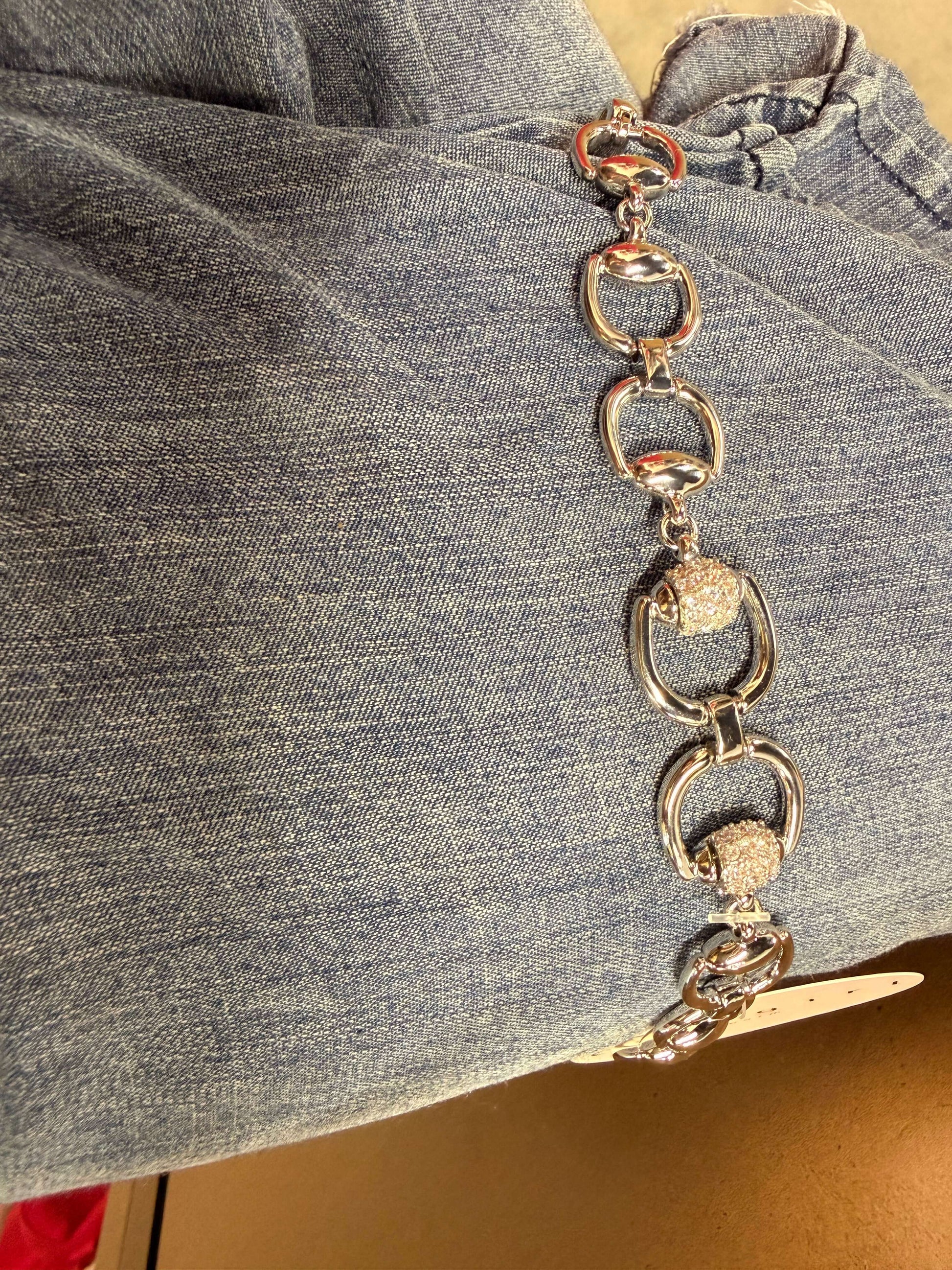 Silver and diamond bead bracelet from Cowgirl Charm, featuring sparkling gemstones on a stylish jewelry accessory.