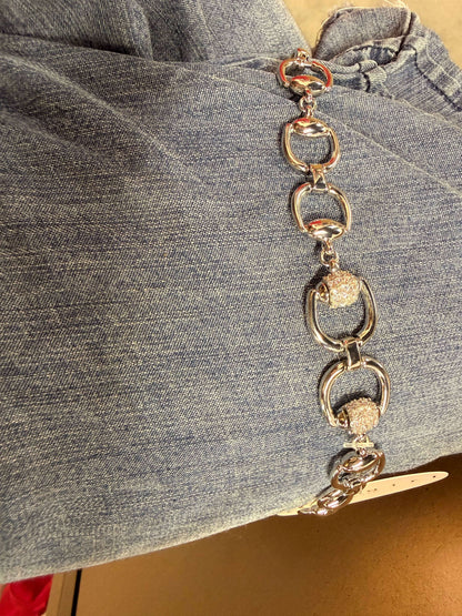 Silver and diamond bead bracelet from Cowgirl Charm, featuring sparkling gemstones on a stylish jewelry accessory.