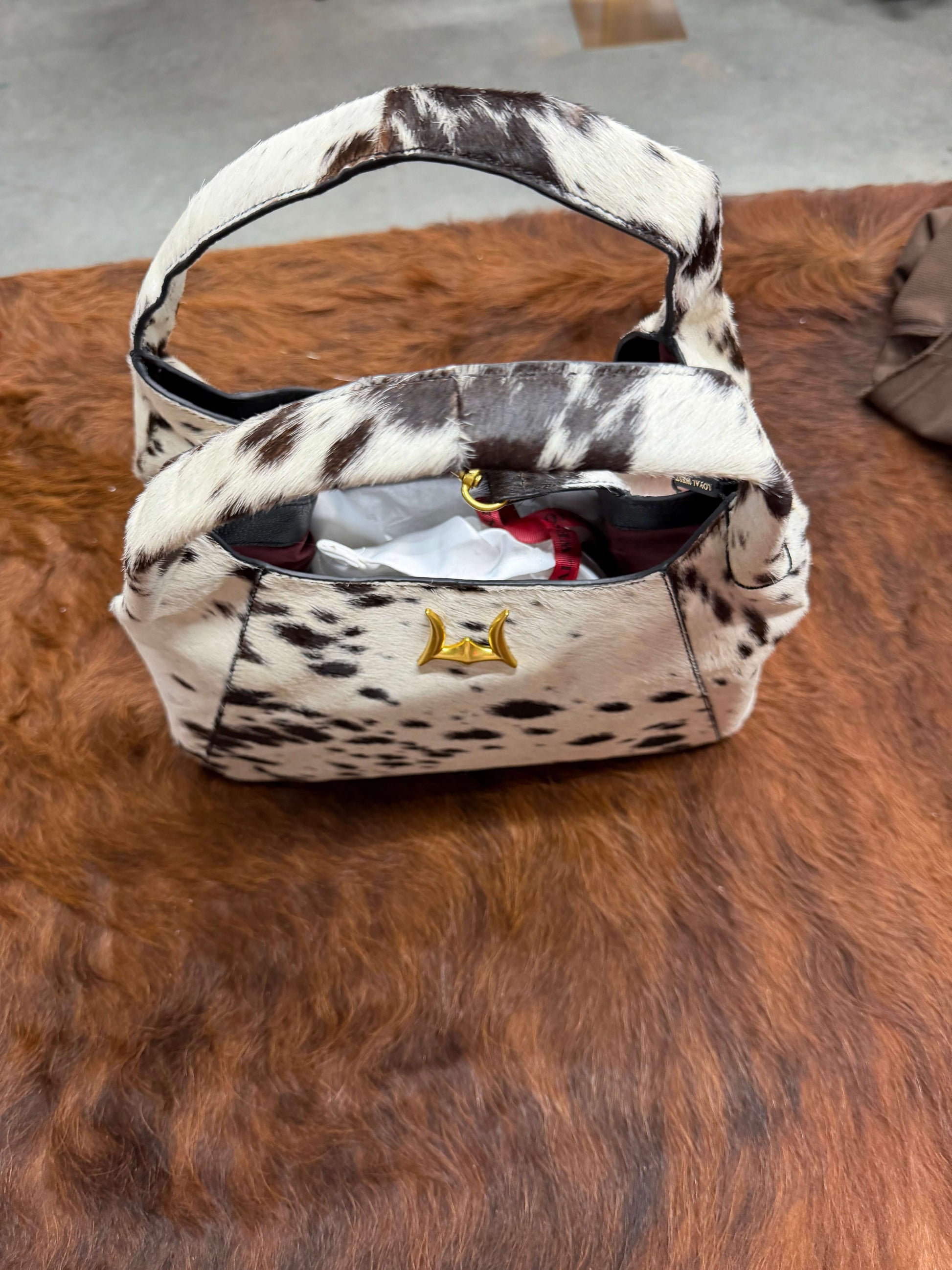Loyal West Vita Servans hobo bag with cowgirl charm, concealed carry design, made of brown leather with decorative accents