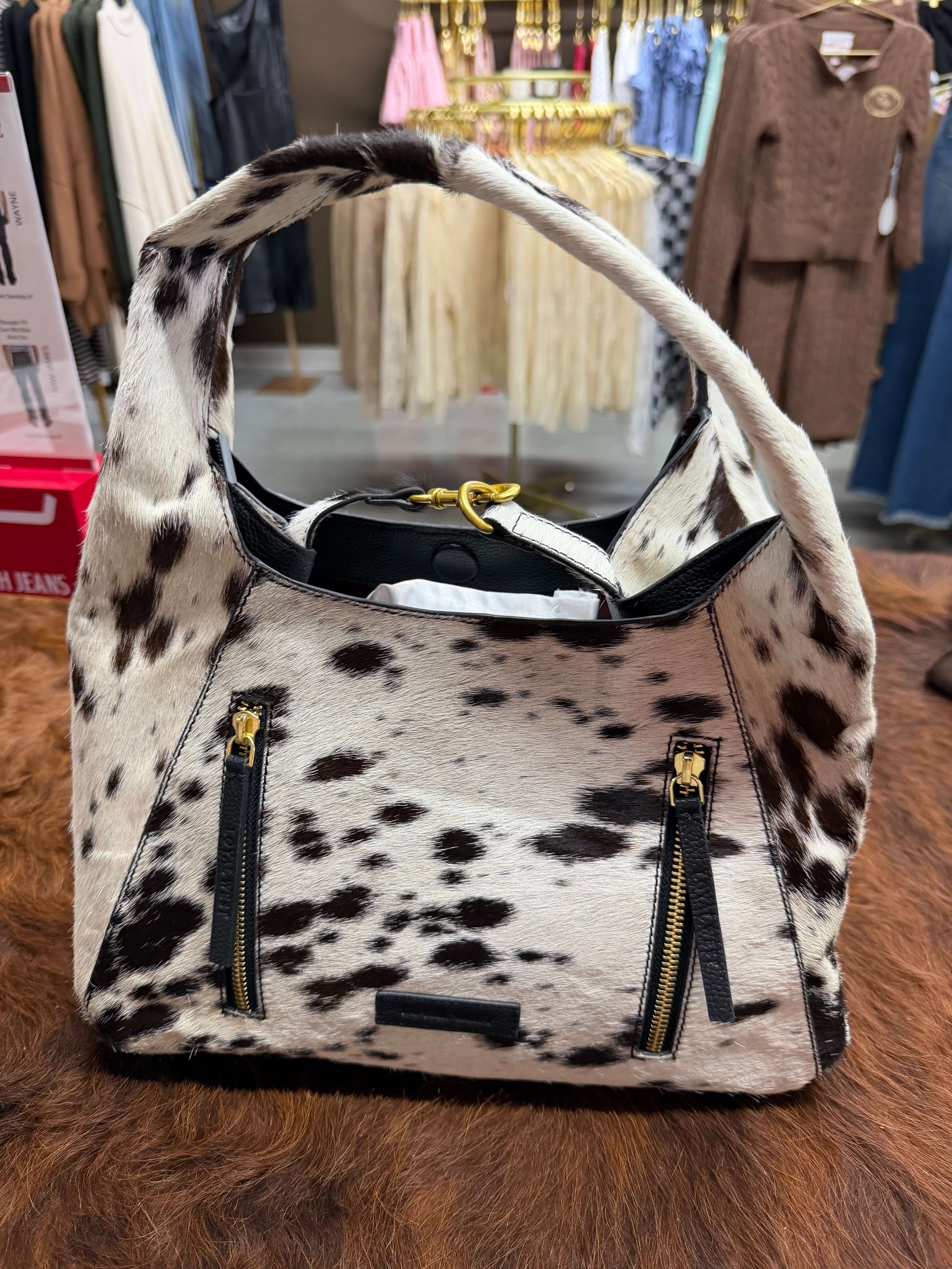 Loyal West Vita Servans Hobo Bag with cowgirl charm, designed for concealed carry, featuring a stylish hobo style and leather details.
