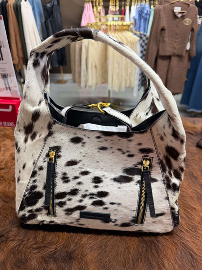 Loyal West Vita Servans Hobo Bag with cowgirl charm, designed for concealed carry, featuring a stylish hobo style and leather details.