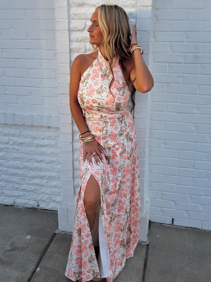 Floral horse printed halter neck tie dress from Lucky & Blessed, featuring vibrant patterns and a stylish halter design.