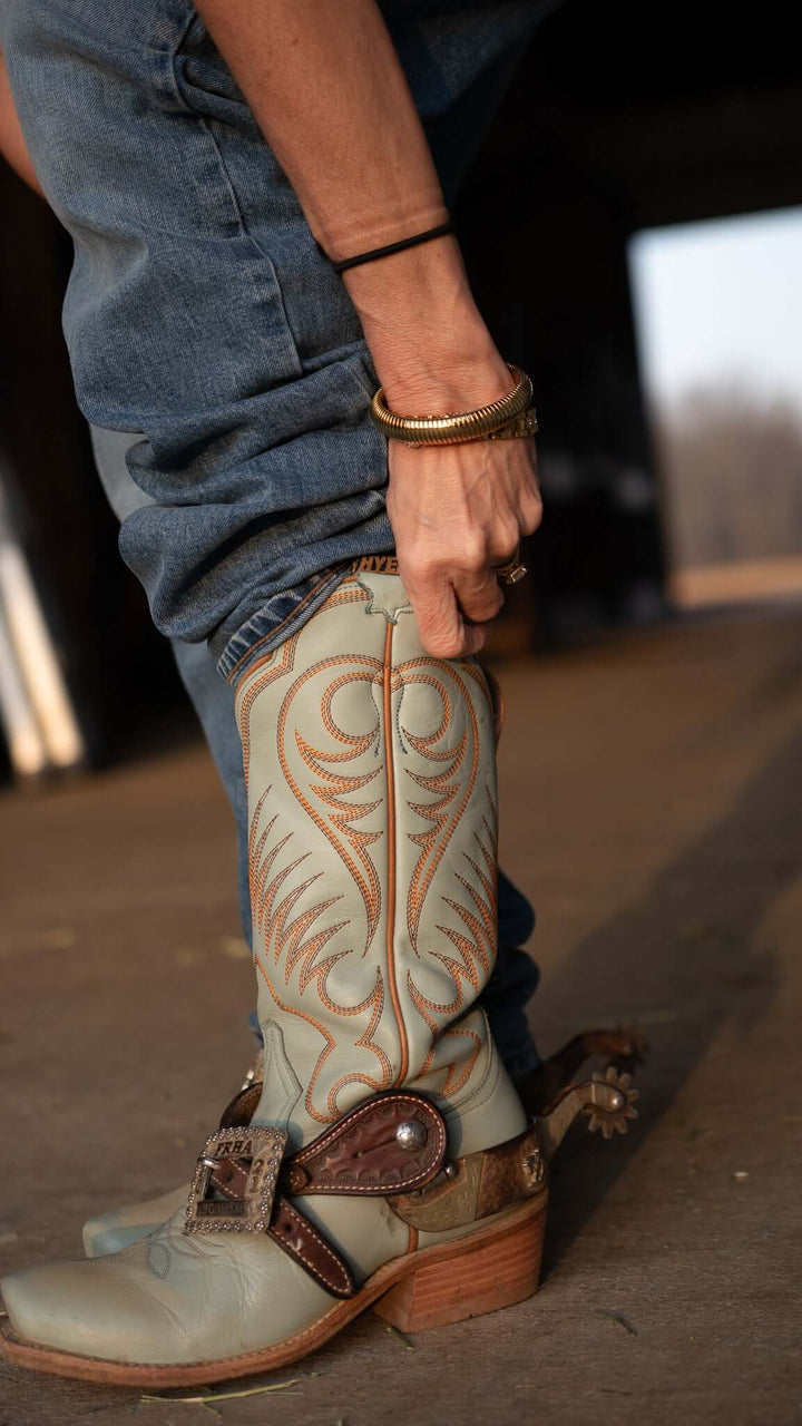 HYER Leawood cowboy boots featuring classic Western design with brown leather and decorative stitching.