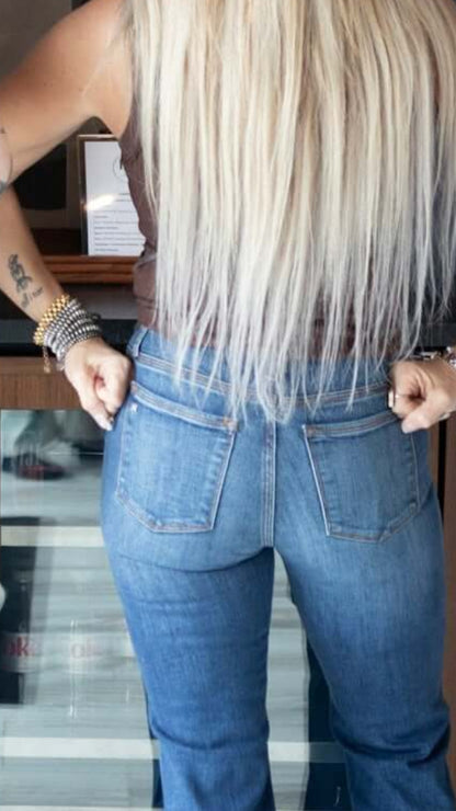 Haala Denim Bella flare jeans in deep ocean blue with gold accents, showcasing stylish bottoms with a flattering fit.
