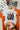 Black Spooky Mom's Club T-shirt by Caramelo Trend featuring Halloween-themed ghost and pumpkin graphics.