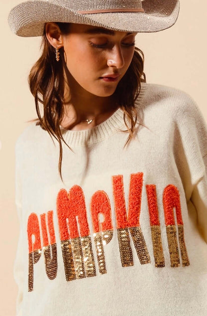 So me contrast sequin pumpkin sweater featuring a cozy knit design with shimmering sequin pumpkin motif on the front.