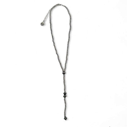 18-inch 18K gold plated beaded Y necklace with 5-inch tail, available in white and yellow gold, by West & Co. jewelry.