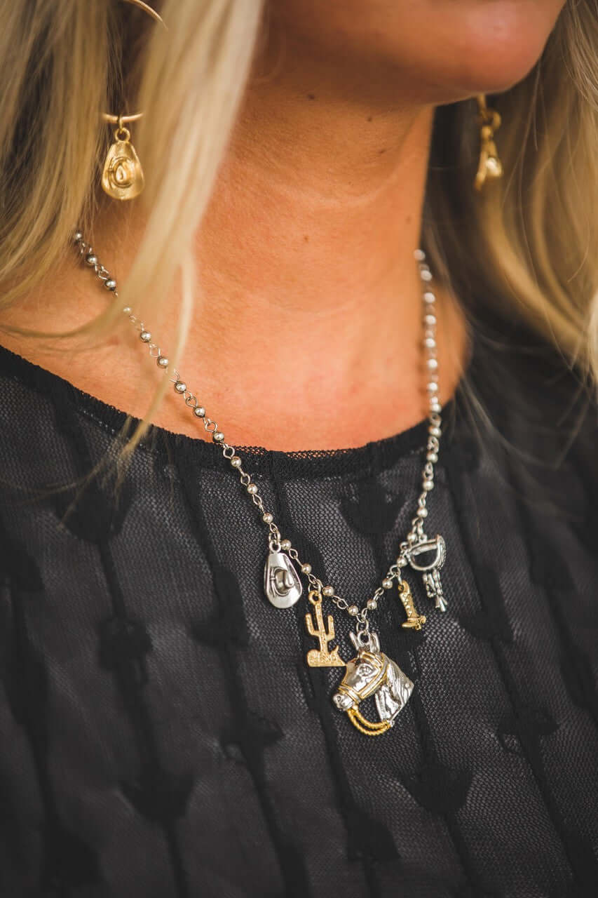 18-inch 18K two-tone plated Western charm necklace by West & Co., featuring a detailed Western-themed pendant.