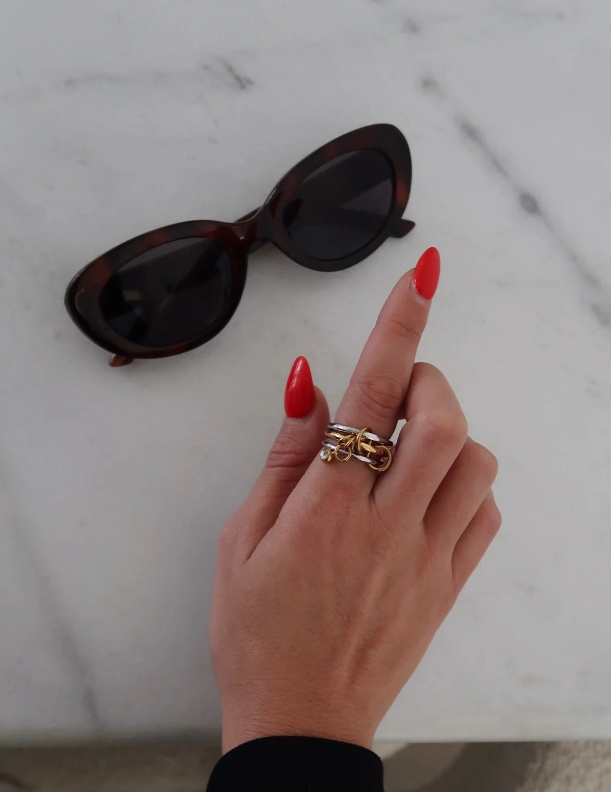 Two-toned Julia ring by Chansuttpearls featuring a stylish design with pearl accents and gold-tone detailing.