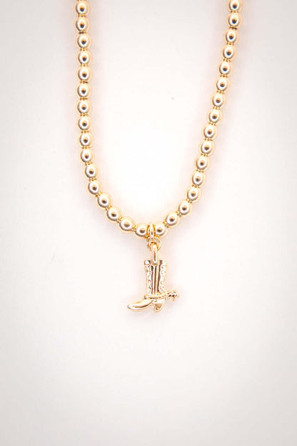 14-inch gold-plated beaded necklace with cowboy boot charm by West & Co., featuring delicate beads and Western-inspired design.