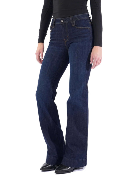 Haala Denim Bella flare jeans in deep ocean blue with gold accents, featuring a stylish wide-leg design and classic denim texture.