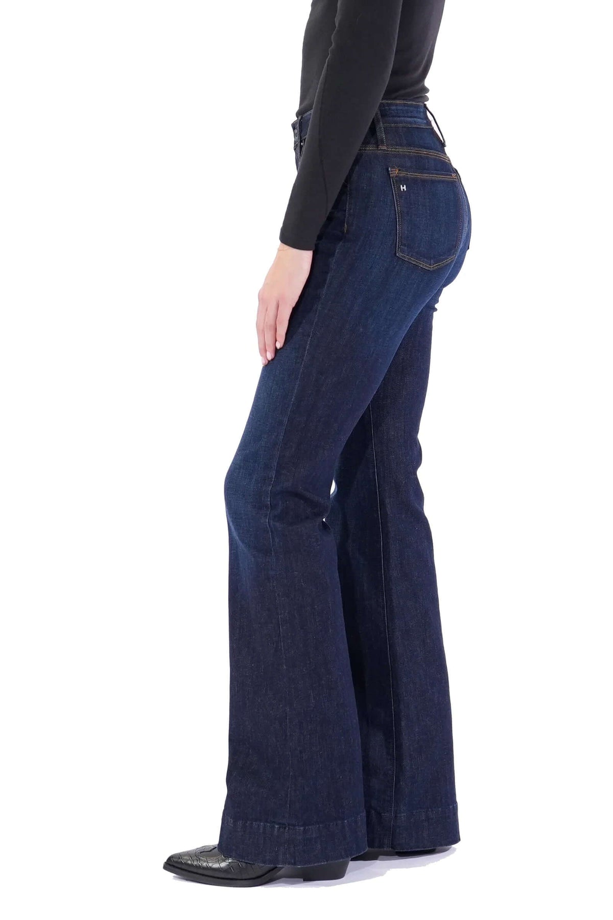 Haala Denim Bella flare jeans in deep ocean blue with gold accents, showing the stylish bottom and flared design.